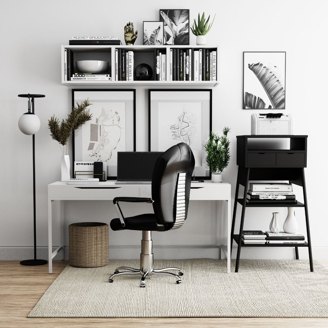 Black and white working space. Desk, chair and decorations